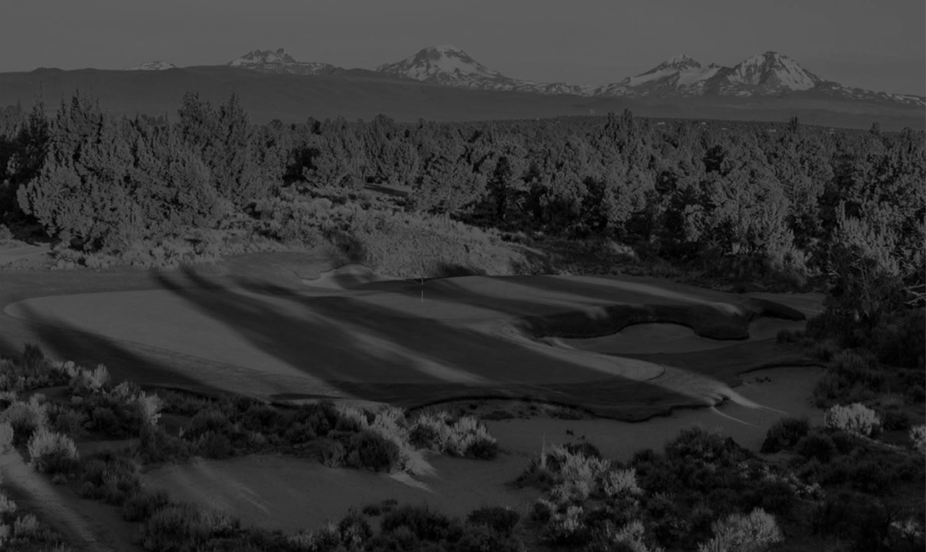 Cinematic Oregon landscape with Three Sisters mountains, Payntr Golf brand territory
